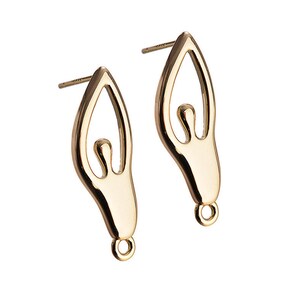 May include: A pair of gold-toned earrings featuring a stylized human figure design. The earrings have a post and butterfly closure.