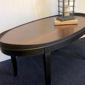 SOLD Please, do not purchase. Refinished Mid Century Modern Black Oval Coffee Table