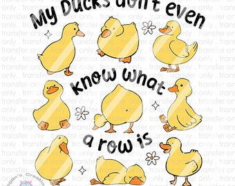 May include: A design featuring several yellow cartoon ducks in various poses, with the text "My Ducks don't even know what a row is" in black. Includes small white flower and star graphics.