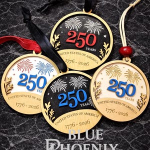 May include: Wooden round ornaments celebrating 250 years of the United States of America, with the text "250 Years" and the years 1776-2026. The ornaments feature fireworks and are available as a digital file.