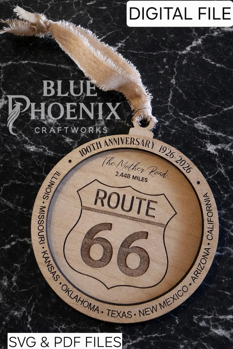May include: Wooden Route 66 ornament with engraved details. Features the Route 66 shield, the text "ROUTE 66", and "100th Anniversary 1926-2026". Includes a beige ribbon for hanging. The text "DIGITAL FILE" and "SVG & PDF FILES" are also visible.
