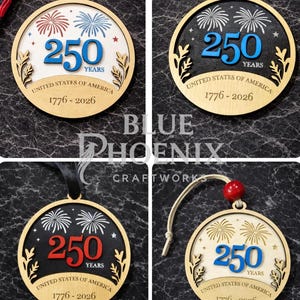 May include: Wooden ornaments with a circular design, featuring the text "250 YEARS UNITED STATES OF AMERICA 1776-2026". The ornaments have a fireworks design and are available in various color schemes, with red, white, and blue accents.