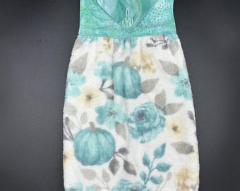 Hanging Hand Towel Celebrates Fall but with All Season Aqua Colored Pumpkins and Flowers on Absorbent White Terry with Aqua Cottons & Button