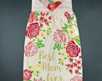 Hanging Hand Towel Says, &quot;Best Mom Ever,&quot; on Light Peach Floral Smooth Terry with Light Peach and Floral Cotton and Floral Button Closure.