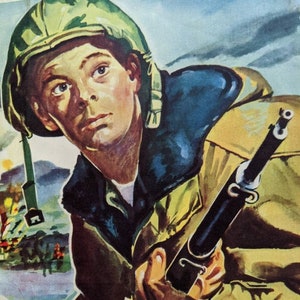 May include: A soldier in a green helmet and brown jacket holds a rifle. He is looking to the left of the image. The background is a blurry landscape with trees and a building.