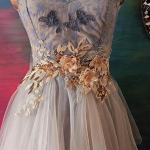 fairy feast dress Dressed in the colors of new leaves and morning dew Complete this look with our mint flutter fairy dress and mint floral 18th century stays! We are down to our last two