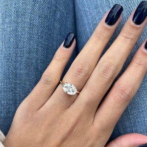 Elegant 2 Carat East West Oval Moissanite Engagement Ring with Hidden Halo Diamond Accent