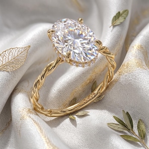 3 karat oval moissanitförlovningsring, tvinnat repband, dolda halo-diamanter, 14K/18K guld