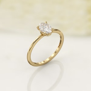 Elegant 0.8 Carat Oval Diamond Solitaire – IGI Certified – 1.3mm Thin Band Ring
