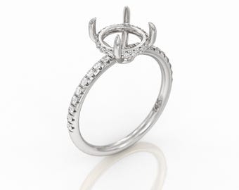 May include: A silver ring with a round center setting and a band of small diamonds.