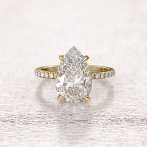 3 carat pear cut moissanite engagement ring & 2 Sided round cut diamond 0.16 ct art deco basket setting ring