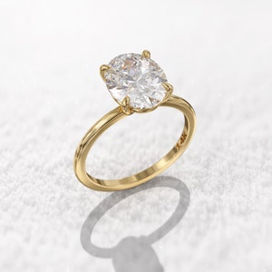 Colorless Oval Solitaire Moissanite Engagement Ring, 1.3mm thin band
