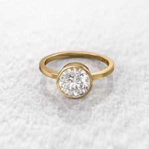 1.5ct solitaire engagement ring 1.5 carat 7.5mm Moissanite Bezel Solitaire 14K yellow gold 1.5mm band polished or matte Finishing