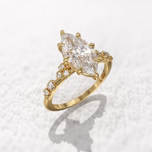 2ct moissanite Marquise engagement ring, claw prongs, clusters sparkling diamonds & thin milgrain textured band