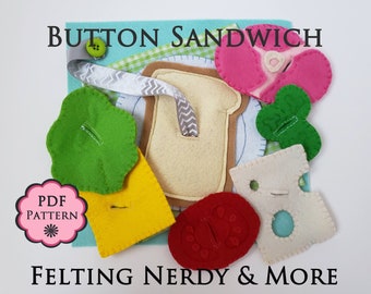 May include: A felt button sandwich play set with a green lettuce leaf, yellow cheese, red tomato, white cheese, and pink ham. The set includes a felt bread slice with a button hole for each food item. The text "BUTTON SANDWICH" is at the top of the image and "PDF PATTERN" is in a pink circle at the bottom left. The text "FELTING NERD & MORE" is at the bottom of the image.