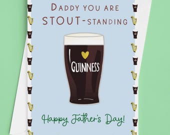 May include: A greeting card with a light blue background featuring a central illustration of a dark stout beer in a glass with a yellow heart and the text GUINNESS. The text reads DADDY YOU ARE STOUT-STANDING and Happy Father's Day! with a border of harps.