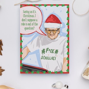 May include: A Christmas card featuring a man wearing a Santa hat and a white t-shirt with the text "*F*CK SCHILLACI" printed on it. The man is holding a steering wheel and has a speech bubble above his head that says "Saving as it's Christmas. I don't suppose a ride is out of the question?"
