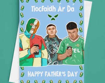 May include: A greeting card with a light blue background featuring three illustrated figures. One wears an Irish flag balaclava and a colorful jacket, while another wears a green soccer jersey. The text reads Tiocfaidh Ár Dá and HAPPY FATHER'S DAY.