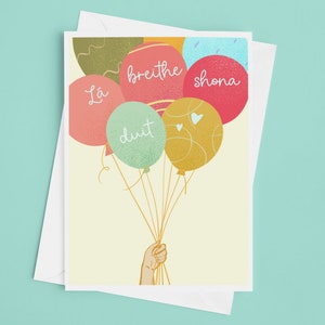 La Bretihe Shona Duit/ Birthday Balloons Irish Language Card
