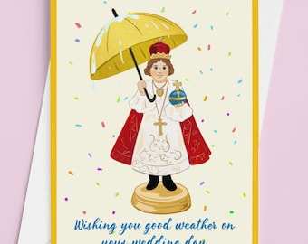 May include: A greeting card with a yellow border and a drawing of a figure holding a yellow umbrella. The figure wears a red cape and a crown, and holds a blue orb. The text reads, "Wishing you good weather on your wedding day."