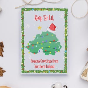 Keep 'Er Lit Noord-Ierland-kerstkaart