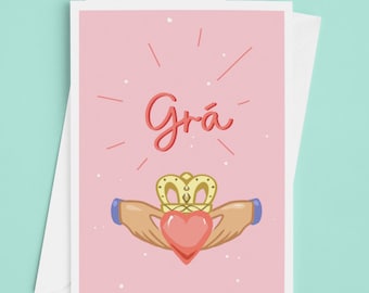 Tarjeta de San Valentín irlandesa con texto "Gra/ Love Irish Language"