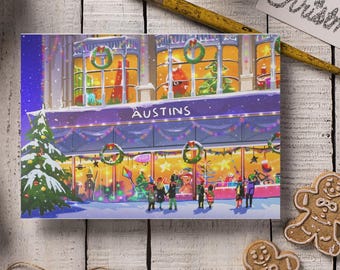 May include: A festive illustration of a shop called "Austins" decorated for Christmas. The storefront is adorned with wreaths, lights, and a Christmas tree. Gingerbread cookies and a pencil are on the wooden surface.
