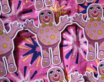 May include: A collection of pink stickers featuring a cartoon character with a smiling face, bow tie, and polka dots. The stickers are scattered on a pink background with a starburst pattern.