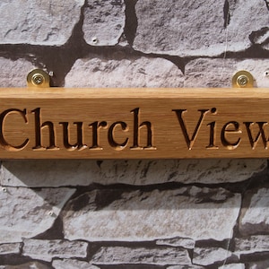 Personalised Signs for any occasion made from solid Oak and personalised with a CNC Router