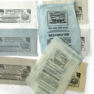 Preworn vintage original levi brand stamped fabrics, reclamed vintage red tab jeans labeled pocket linings bunch, branded fabrics for crafts