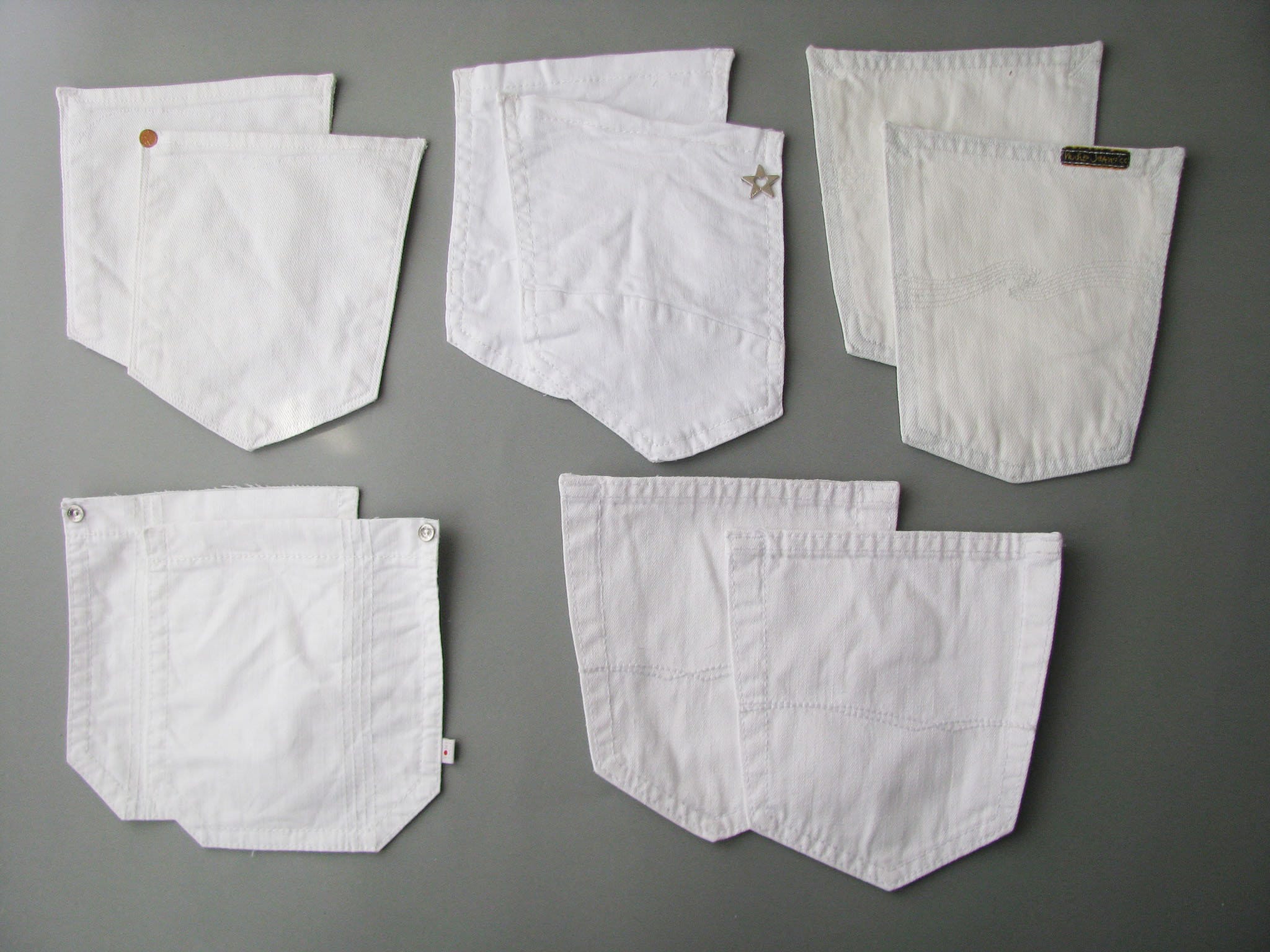 10 reclaimed white jeans back pockets on base fabric, DIY denim quilt supply, denim pockets mix, jeans scrap