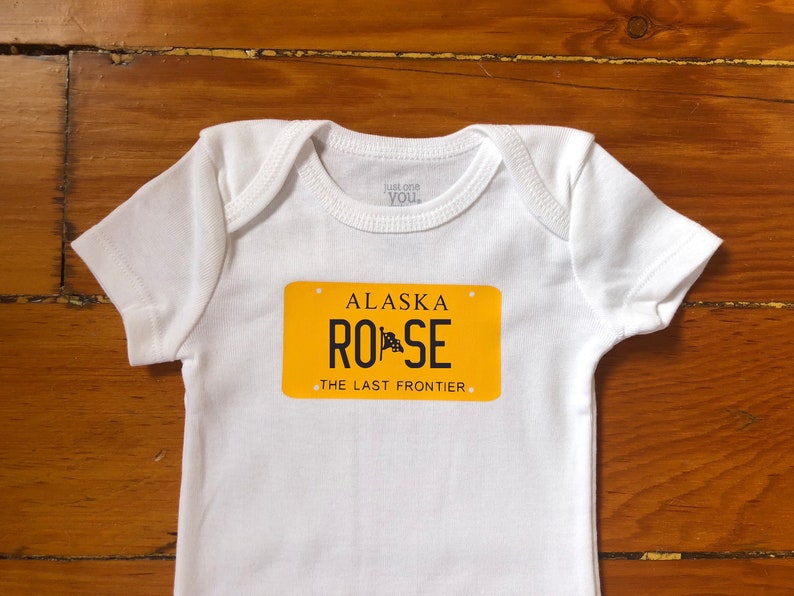 View My Shop For All 50 States Alaska License Plate Art Baby Bodysuit in Gift Wrap Personalized