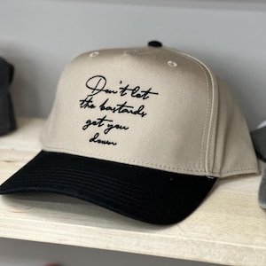 Embroidered Trucker Hat: Don't Let the Bastards Get You Down