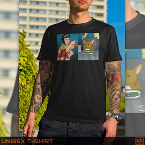 May include: Black t-shirt with a white and yellow image of a popular anime character pointing at a dog eating food from a plate. The text "This is fine" is written on the image.