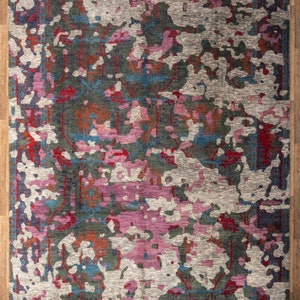 May include: Abstract area rug with a colorful design featuring shades of pink, blue, red, and green. The rug has a distressed look and a subtle pattern. Item Code - 7985 Size - 10x14 ft, 300x450 cm.