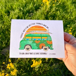 May include: A green vintage van with a surfboard on top and a sunflower design. The van has a sunset background and the text "THERE ARE FAR BETTER THINGS AHEAD THAN ANY WE LEAVE BEHIND." - CS. LEWIS.