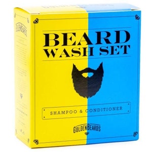 Puede incluir: Una caja amarilla y azul con el texto "BEARD WASH SET" y "SHAMPOO & CONDITIONER" impreso en ella. La caja presenta una silueta negra de una barba con un logotipo de diamante que dice "GOLDENBEARDS".
