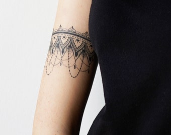 Get Female Polynesian Flower Band Tattoo PNG