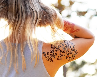 leopard print shoulder tattooПоиск в TikTok