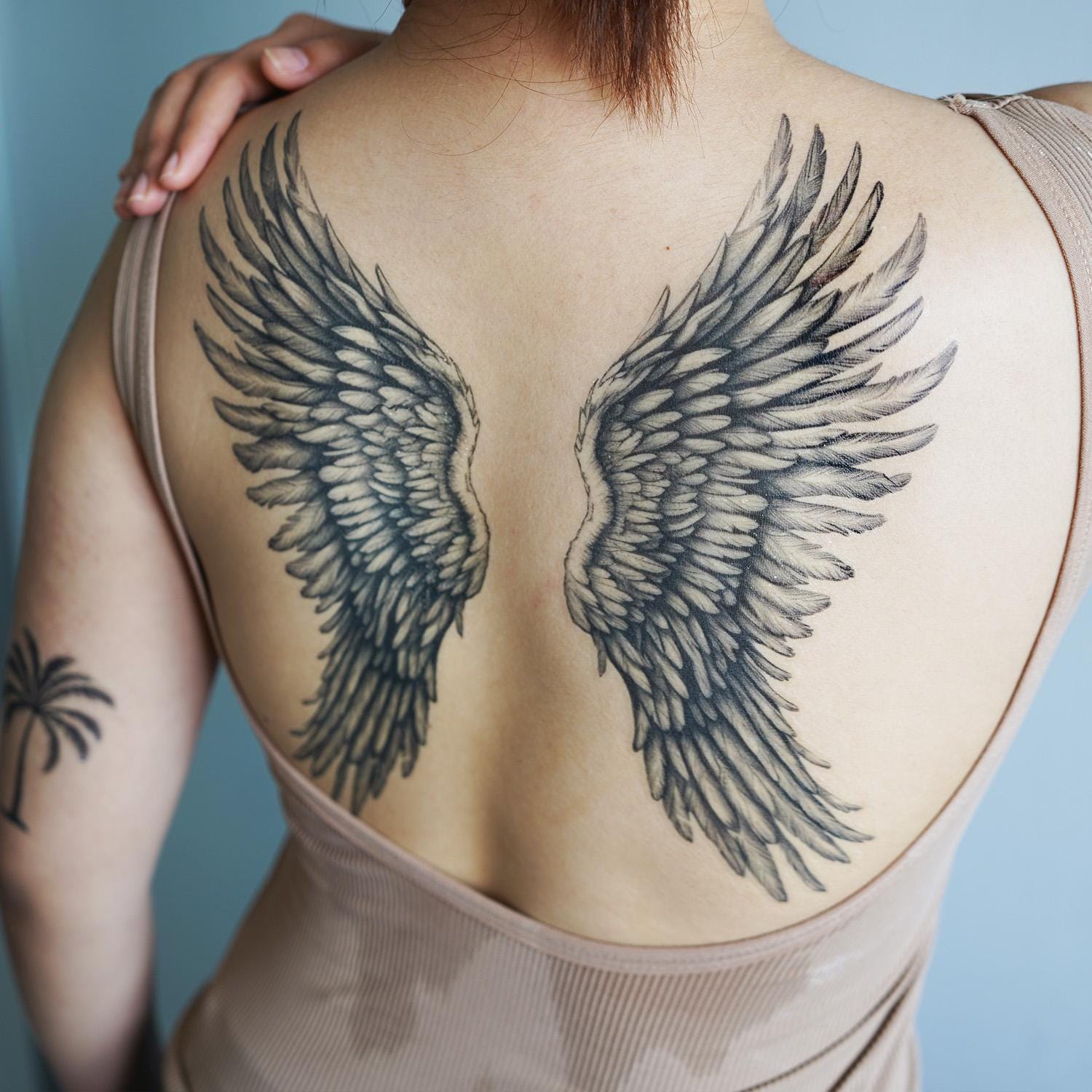 Angel on the Back: A Symbol of Protection