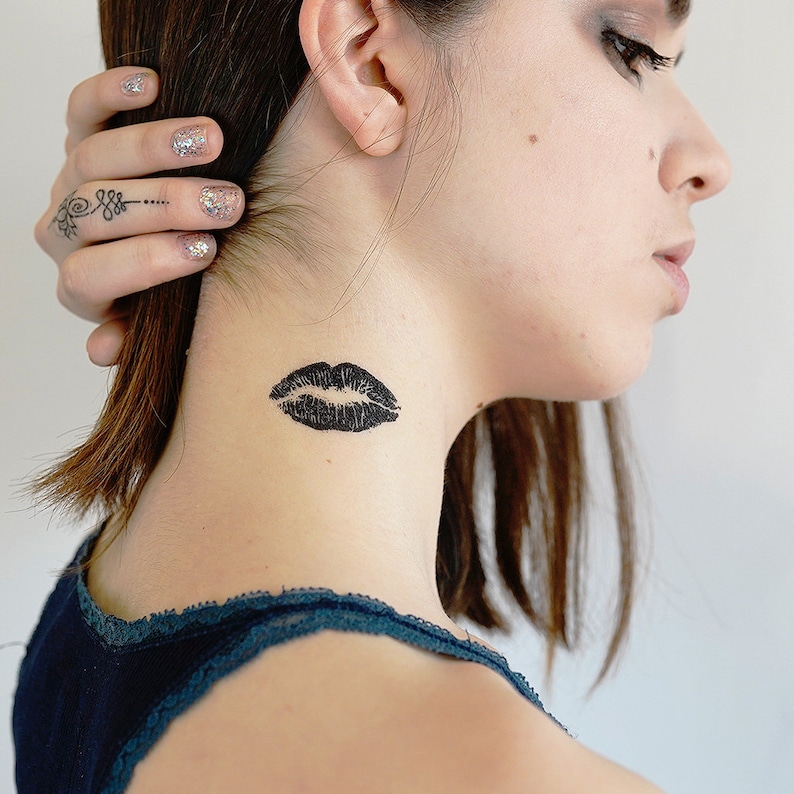 Lips Tattoo on Neck 