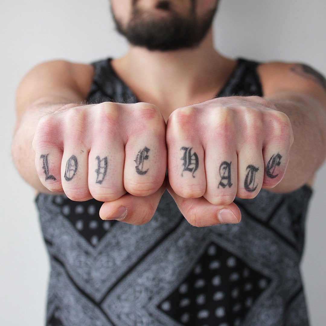 Knuckle tattoos Millennials are getting creative with eight characters   The Independent  The Independent