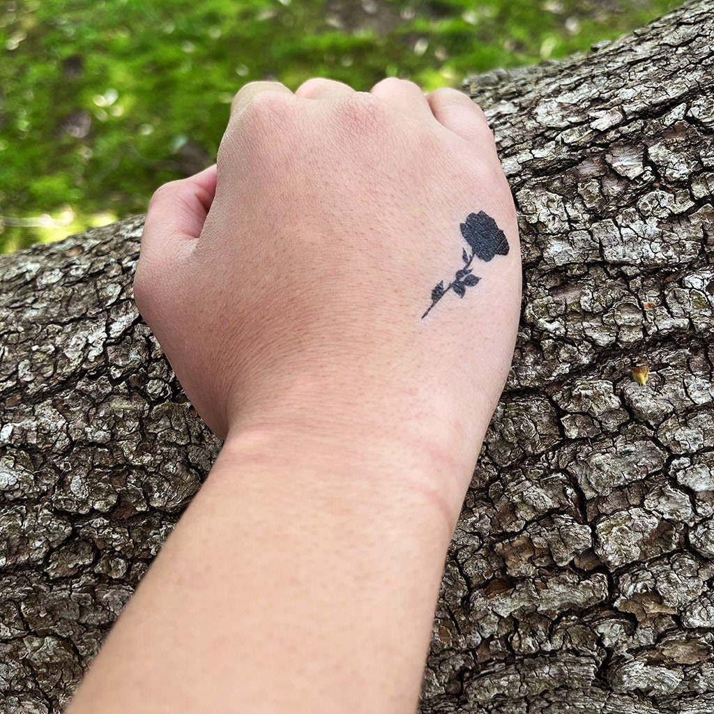 Small Black Rose Tattoo On Wrist