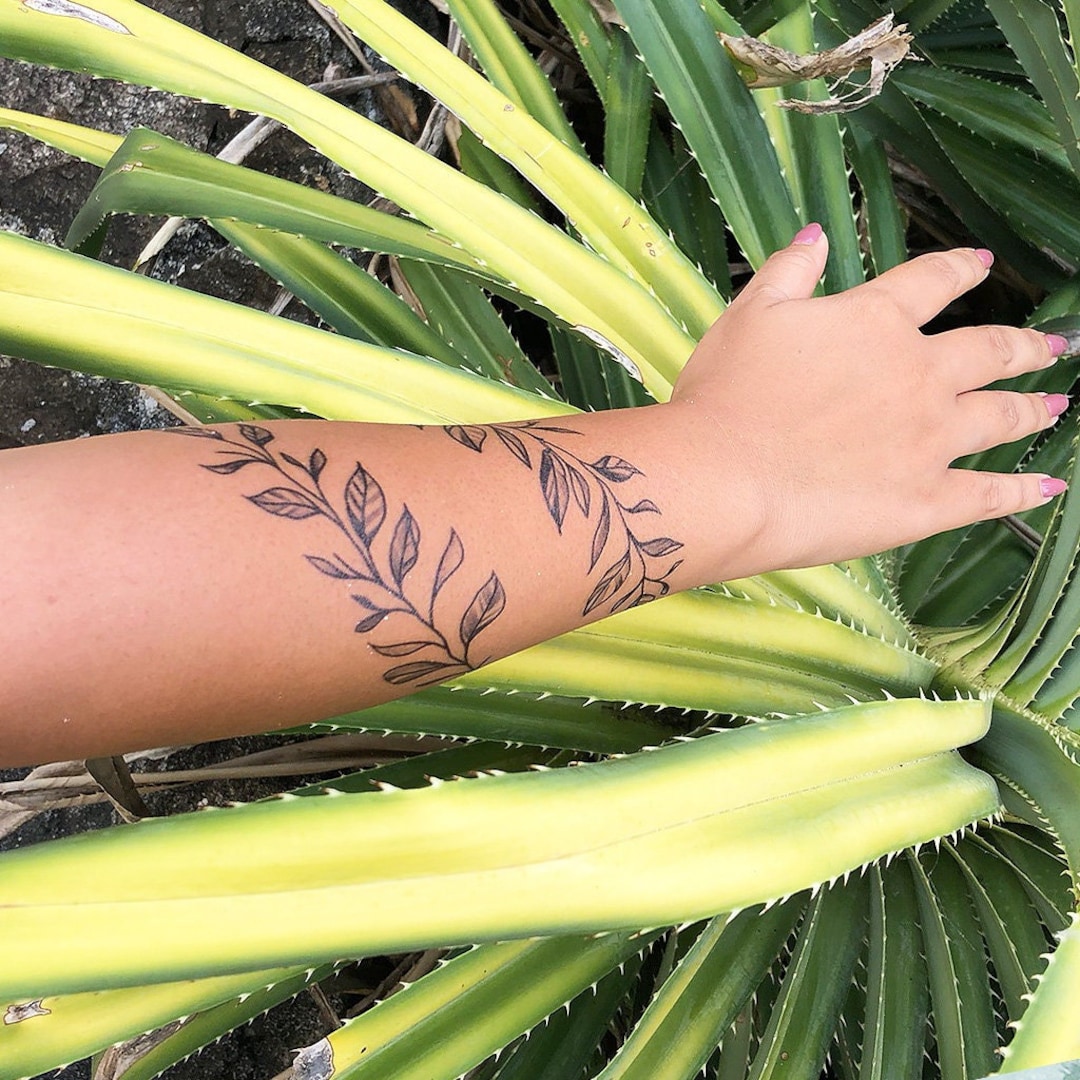 52 Lovely and Exceptional Vine Tattoos Ideas and Designs On Arm