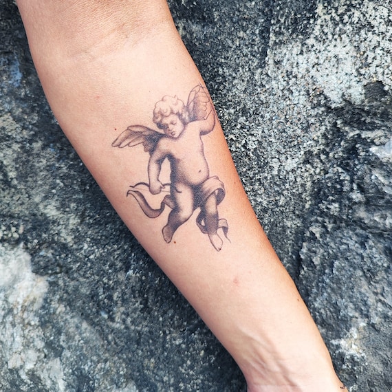 20 Angel Tattoos for Men of Faith 2023  The Trend Spotter