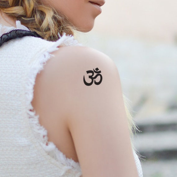 8 Unique and Inspiring Yoga Tattoos + Their Meaning