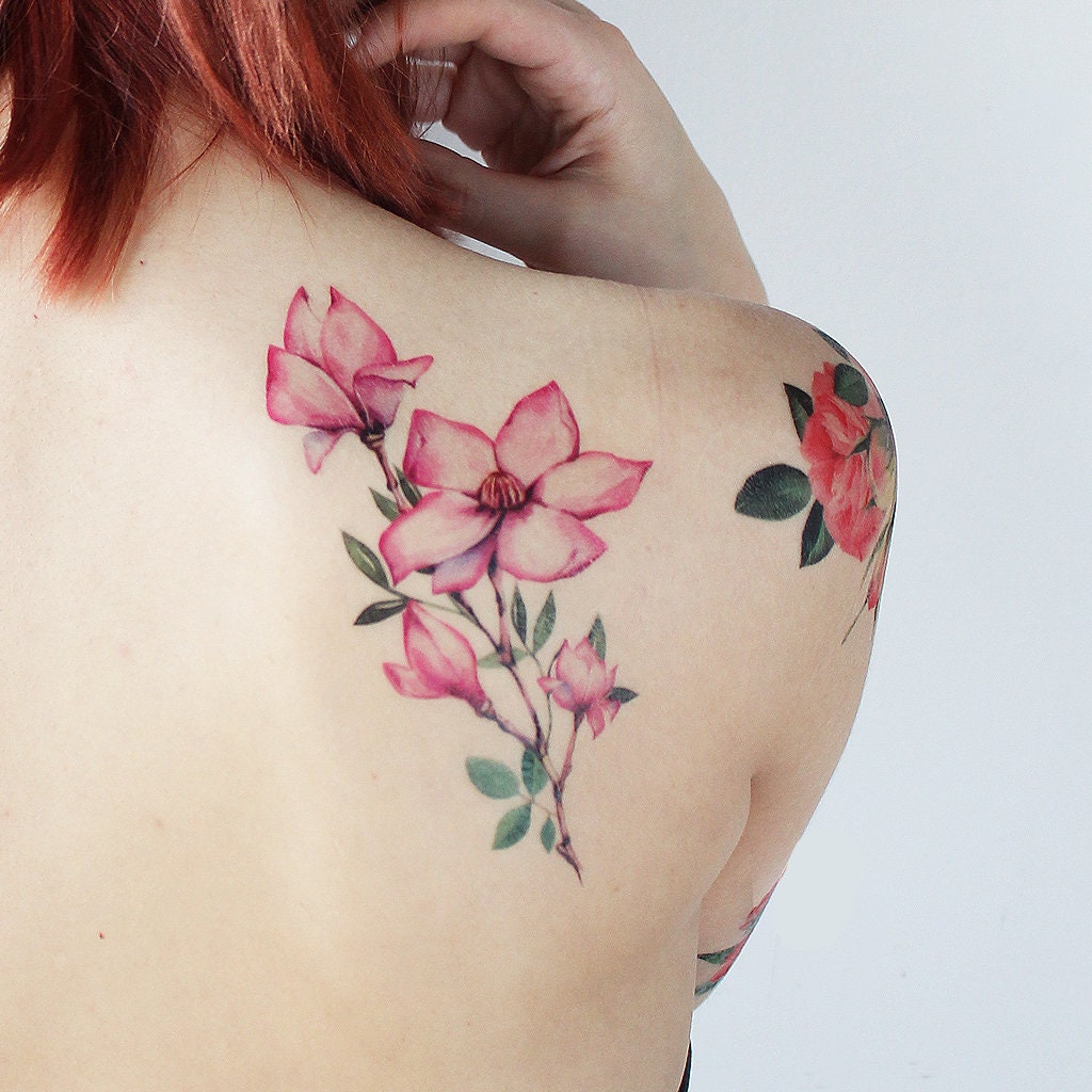 Magnolia tattoo by tattooist GNO  Tattoogridnet