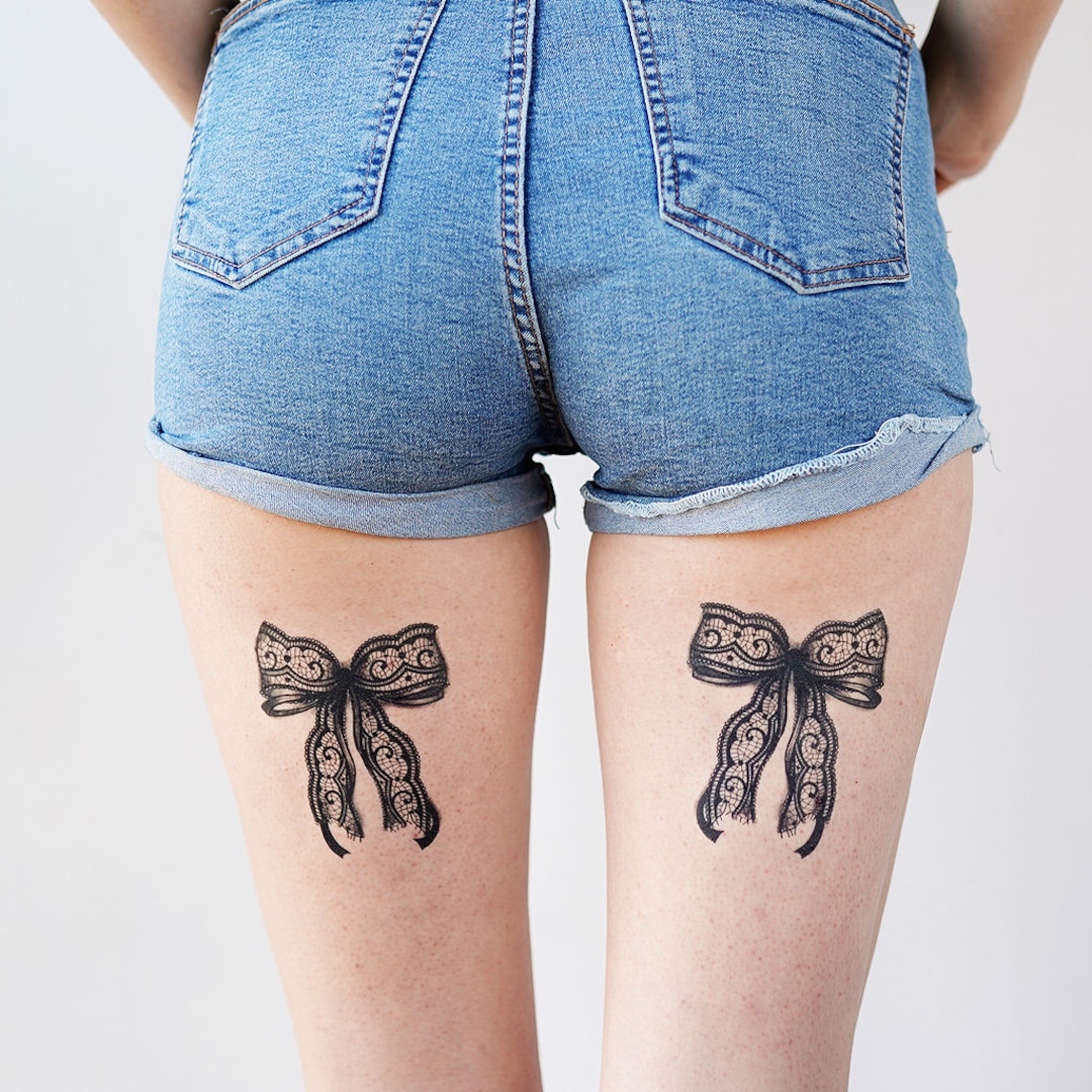 black lace bow tattoo