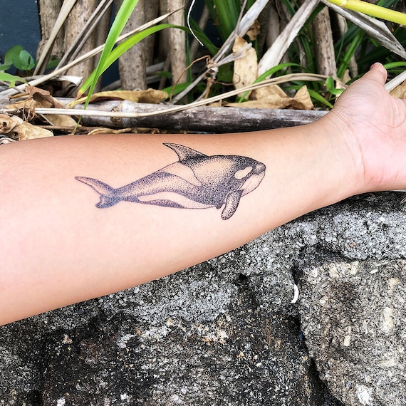 Is it illegal to get a whale tattoo on the arms  Quora