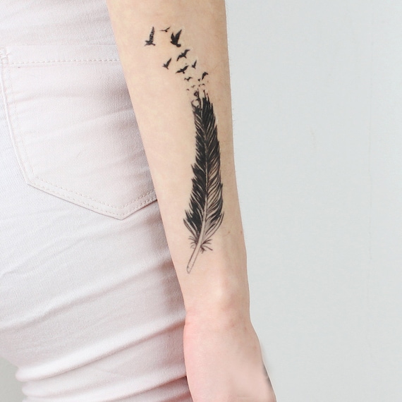 Colorful Feather Tattoo with Pearls on Wrist - Black Poison Tattoos